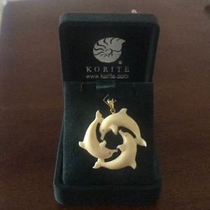 Korite Mammoth Ivory Dolphins Pendant.